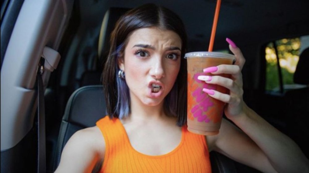 Charli D'Amelio holding her own Dunkin' order