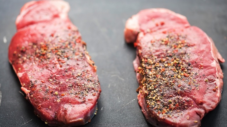 Seasoned raw ranch steaks