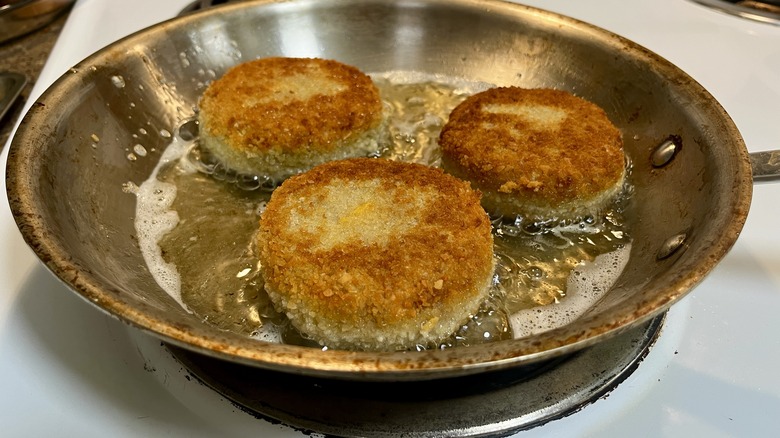 chicken patties in frying pai