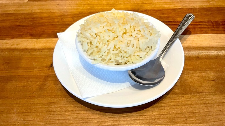 cheddar's seasoned rice on white plate