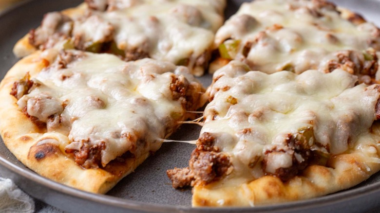 sloppy joe flatbread cut into pieces