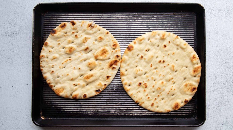 flatbreads on a sheet pan