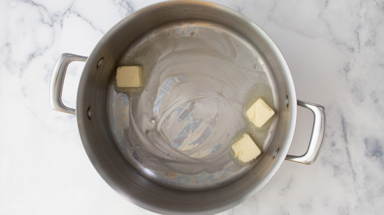 butter cubes in pot