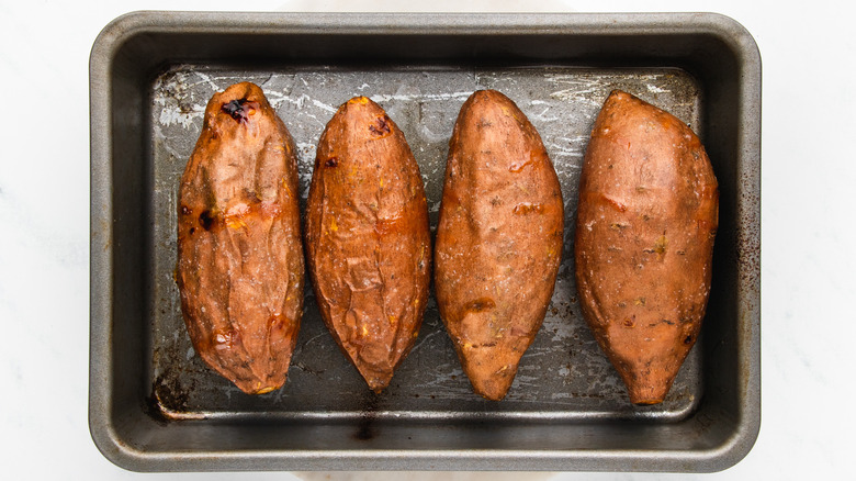 baked sweet potatoes in baking pan