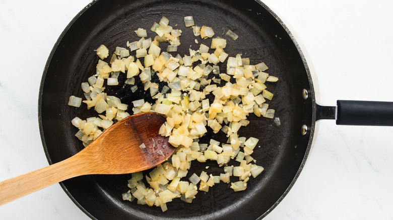 onion frying in pan