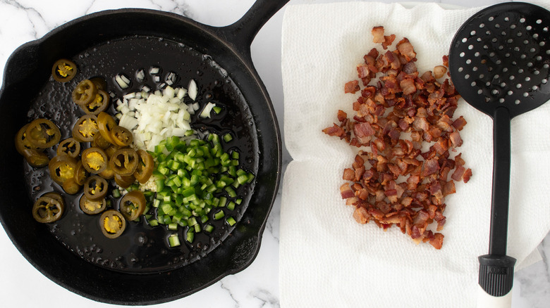 garlic, onions, and jalapeños frying