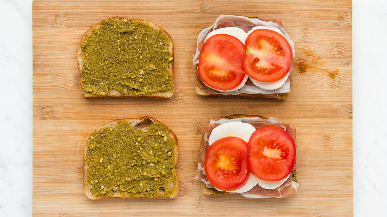 Prosciutto pesto paninis being prepared