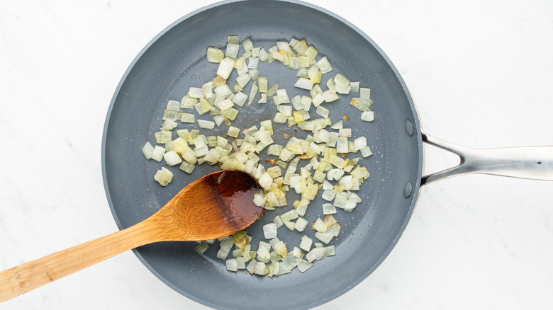 onion sauteing in frying pan