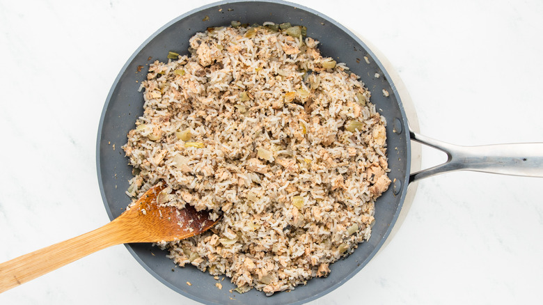 salmon and rice mixture in frying pan