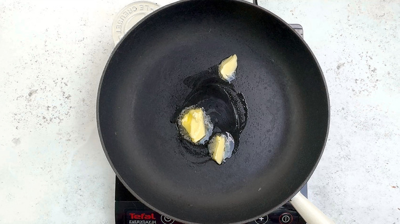 butter melting in pan