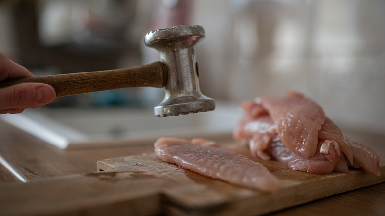 Hammer tenderizing meat