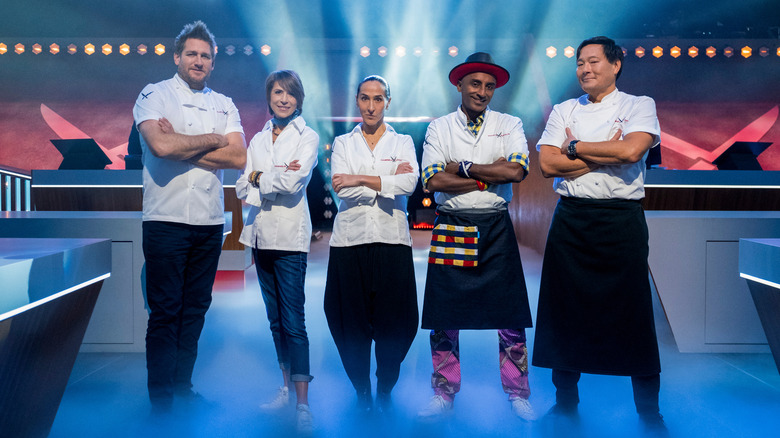 New Iron Chefs posing in Kitchen Stadium