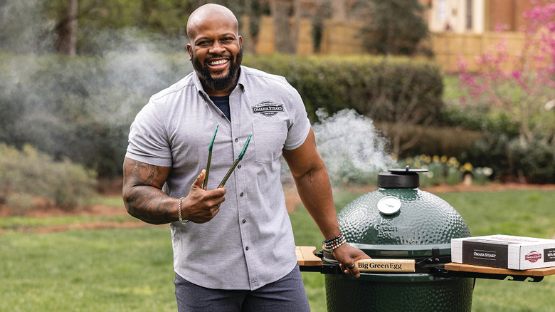 Chef David Rose grilling steak with big green egg