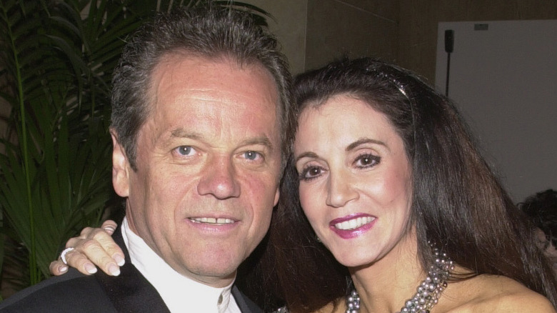 wolfgang puck and barbara lazaroff posing for photo