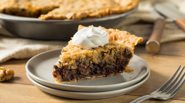 A plated slice of Kentucky Derby pie