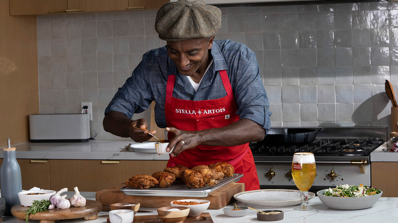 Chef marcus samuelsson tossing food