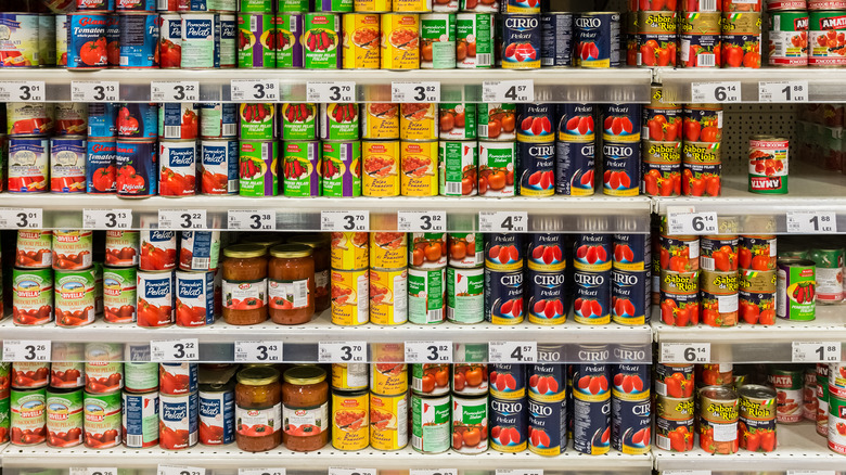 Canned tomatoes in a supermarket 