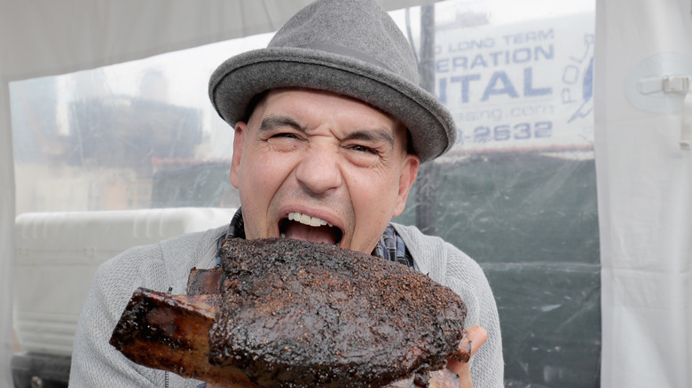 Michael Symon eats BBQ