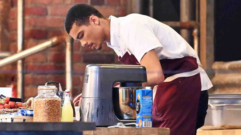 Nuri baking in low level kitchen 