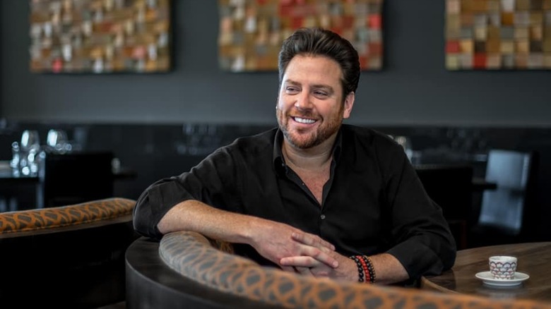 Scott Conant sitting