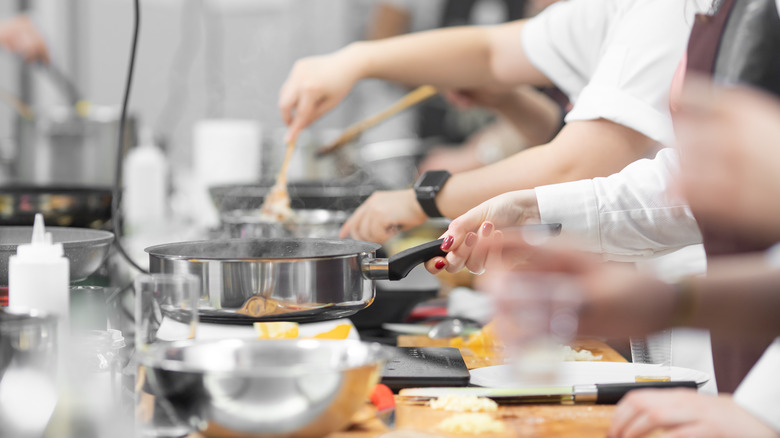 Student chefs cooking food