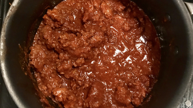 cooking chili on the stove