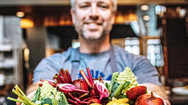 William Dissen with fresh vegetables 