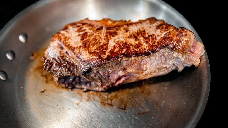 hard-seared steak in a pan