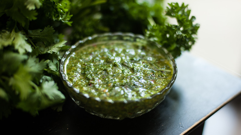 Green sauce bowl with parsley