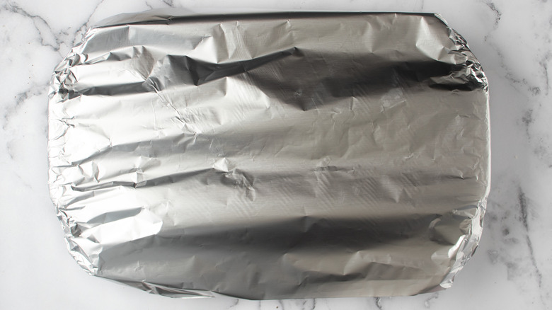 tin foil covered casserole dish