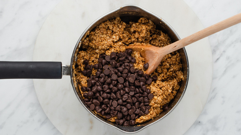 Oat mixture and chocolate chips in pot