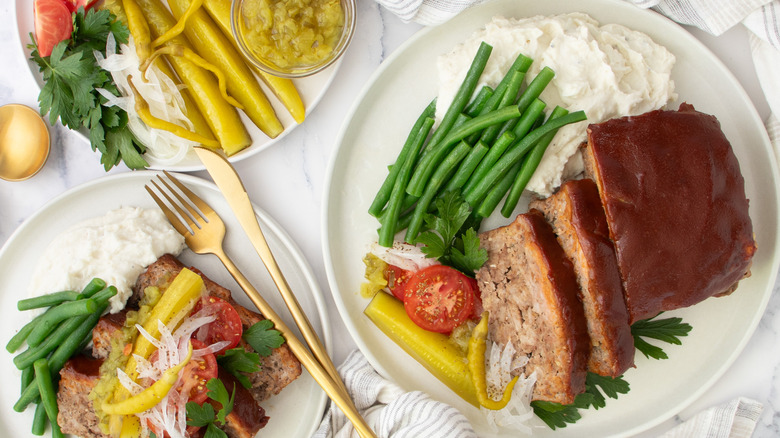 sliced meatloaf with garnishes