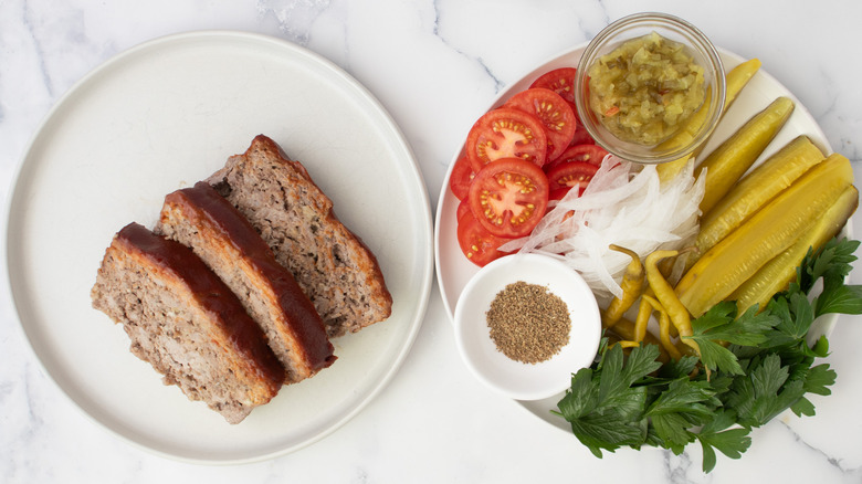 sliced meatloaf with garnishes