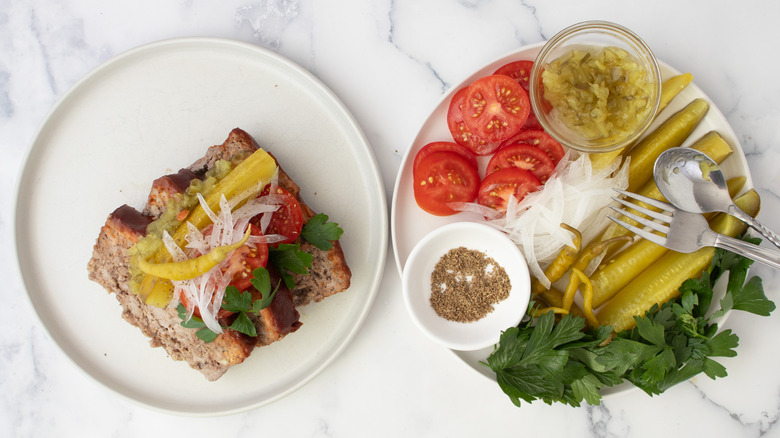 sliced meatloaf with garnishes