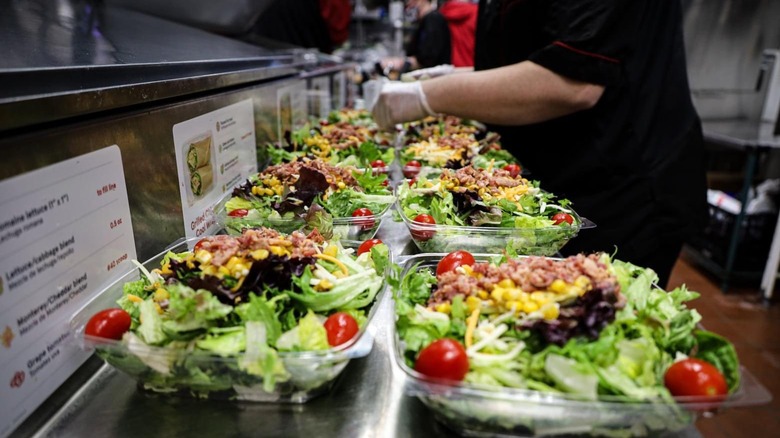 Chick-fil-A employee making cobb salads