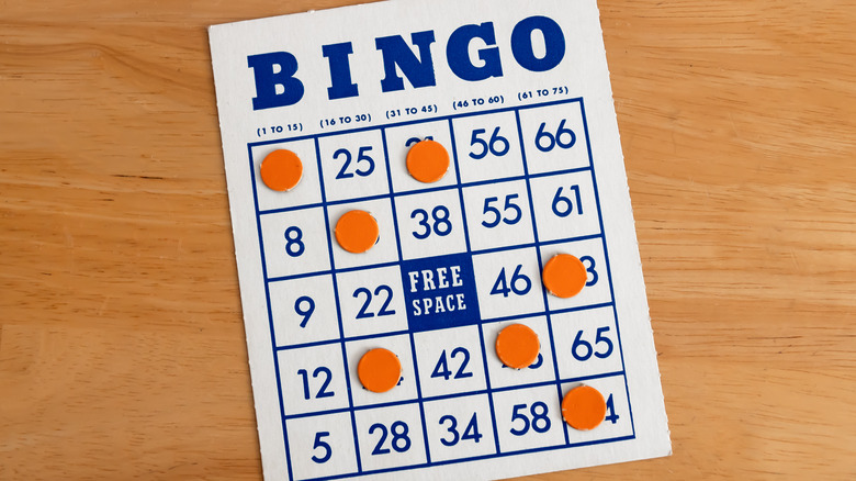 BINGO card with spots filled in with orange discs