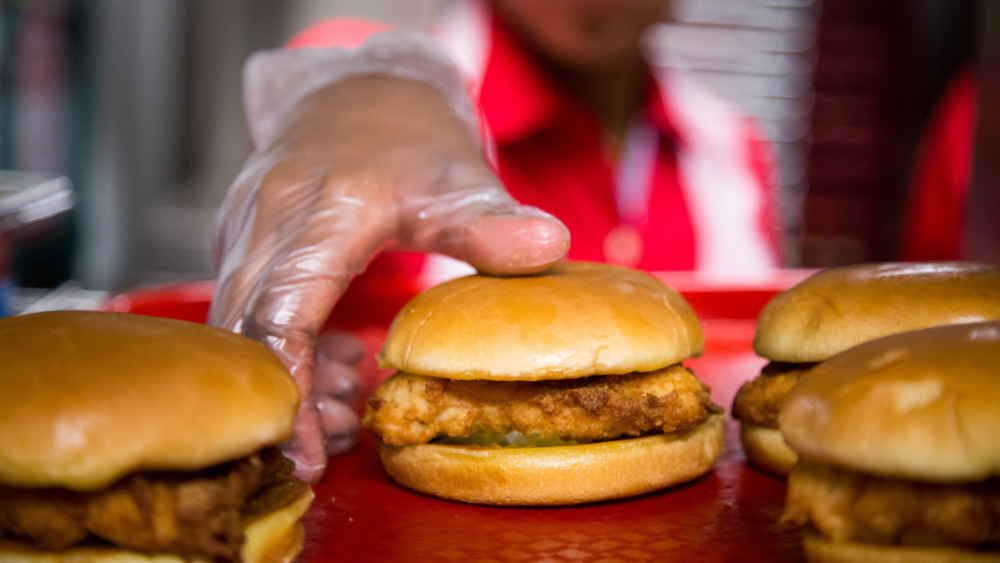 Chick-fil-A employee manually completing an order