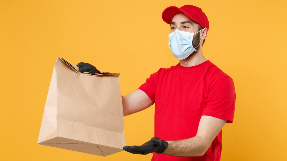 Delivery person with food