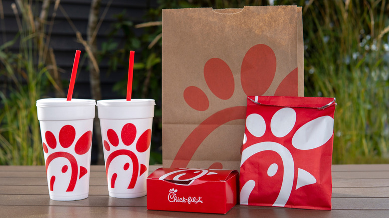 Chick-fil-A bag, drinks, food