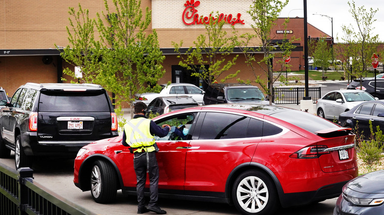 Chick-fil-A employee at drive-thru line