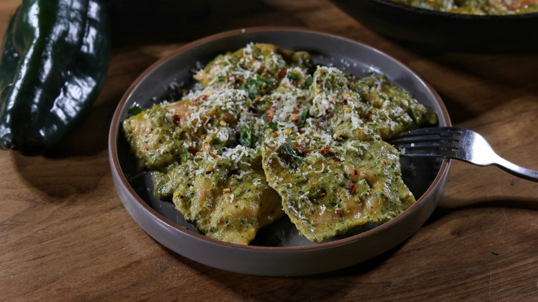 plate of ravioli in poblano cream sauce