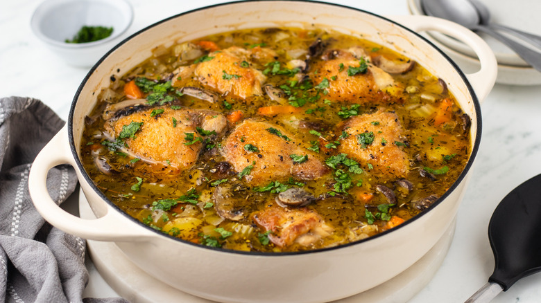 Chicken and vegetable casserole in pot