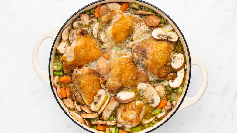 Chicken and vegetable casserole in pot