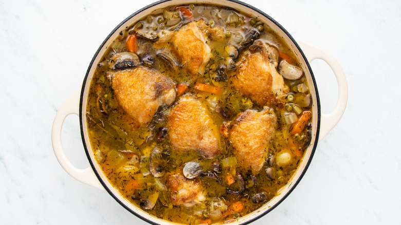 Chicken and vegetable casserole in pot