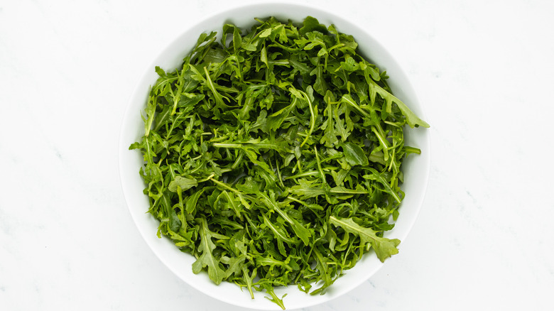 arugula in serving bowl