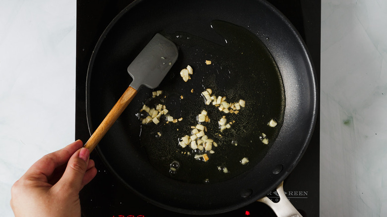 browned garlic in a pan