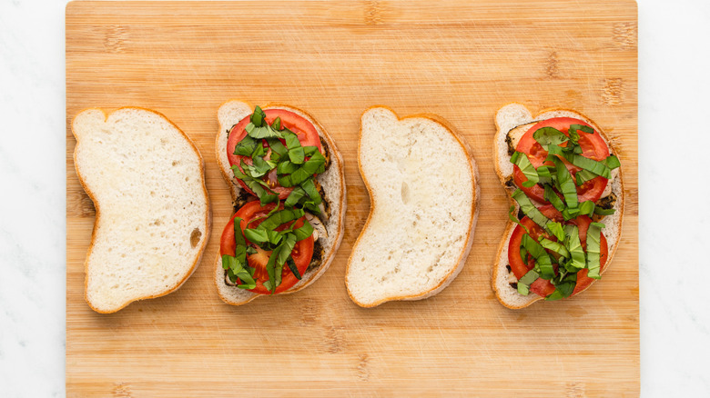 assembling panini on cutting board