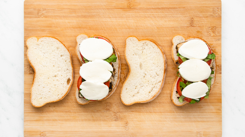 assembling panini on cutting board