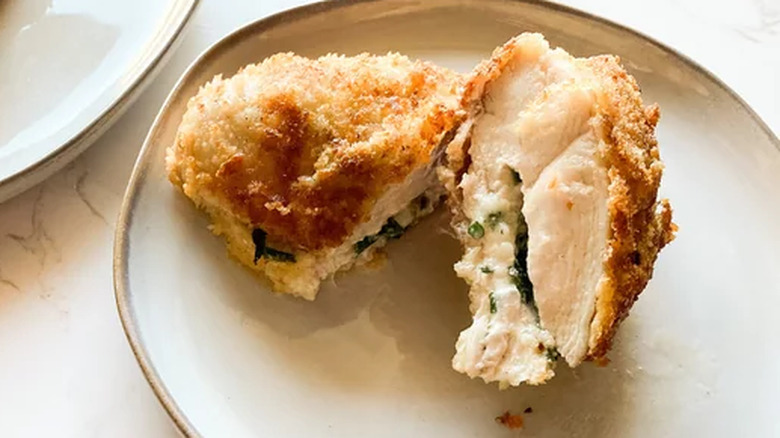 Breaded stuffed chicken breasts