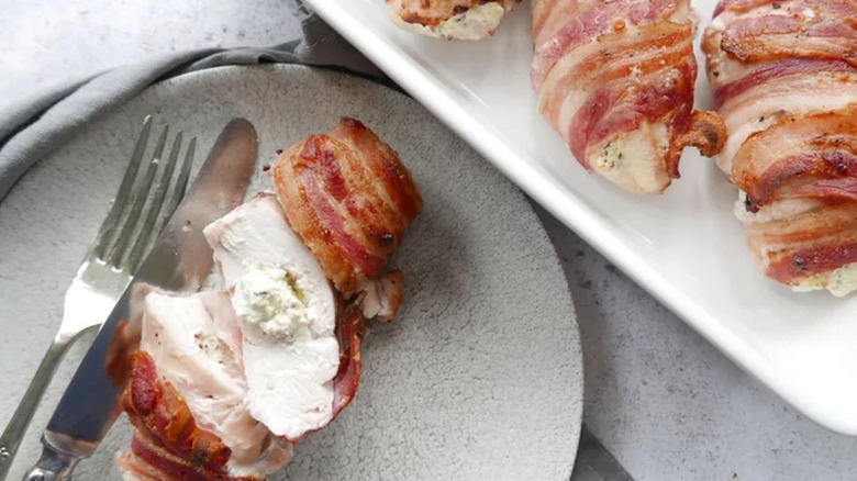 Bacon wrapped cooked chicken breasts